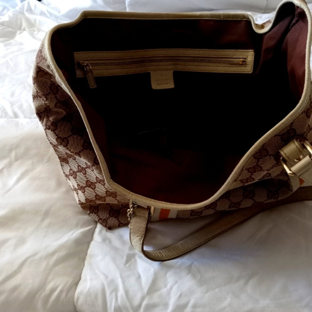 AUTHENTIC GUCCI purse.  Brown with tan and yellow stripes